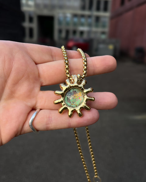 Green Sun with Pink Stardust