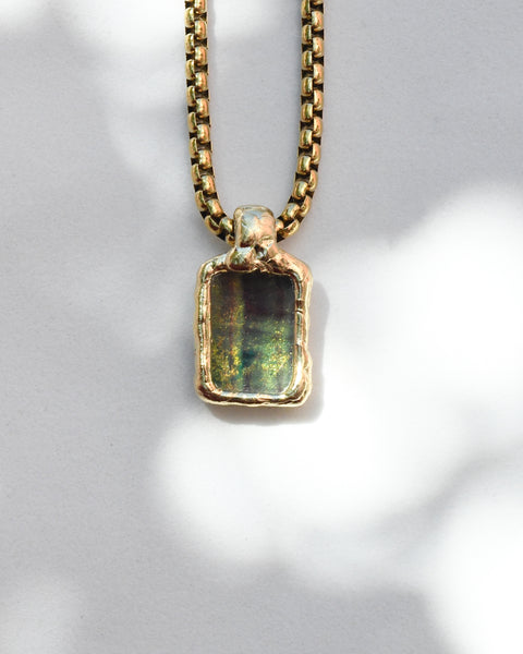 Fluorite with golden Stardust underneath